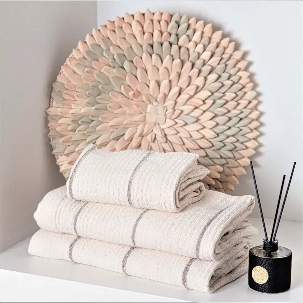 a porcupine basket against a wall on a corner shelf